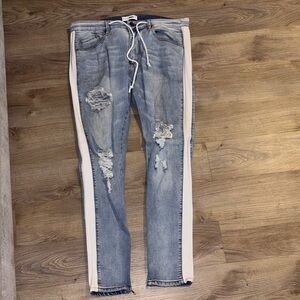 Fashion Nova Light Blue Distressed Skinny Jeans